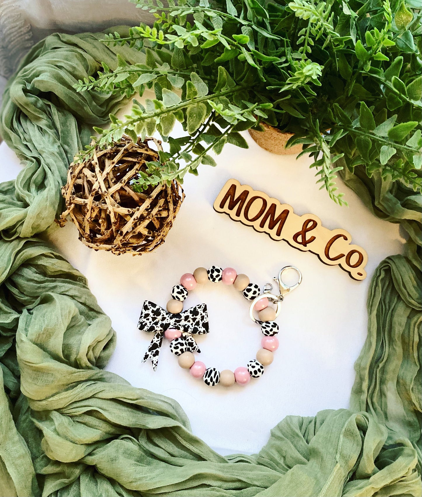 Pink Cowprint Bow Bead Wristlet