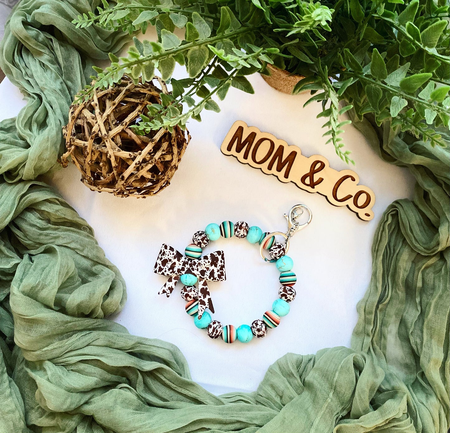 Western Brown Cowprint Bow Bead Wristlet