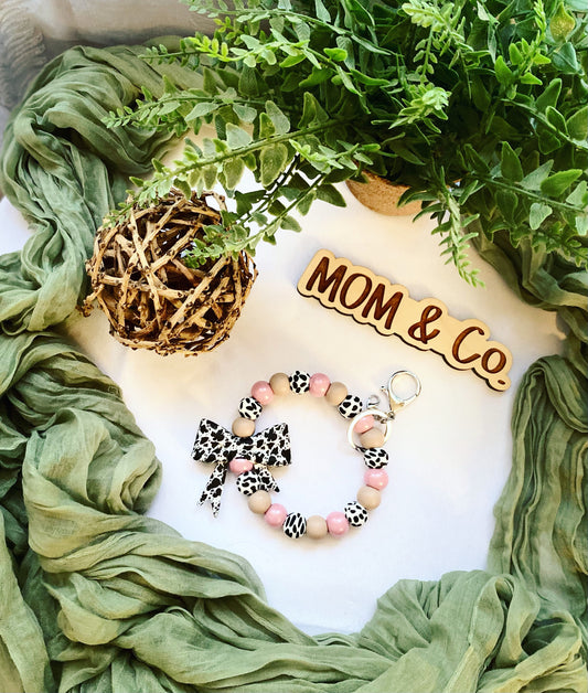 Pink Cowprint Bow Bead Wristlet