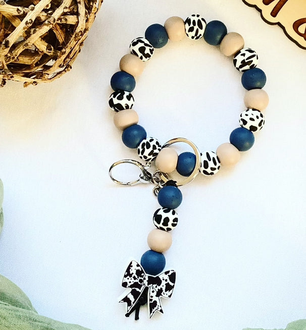 Navy Blue Cowprint Bead Wristlet