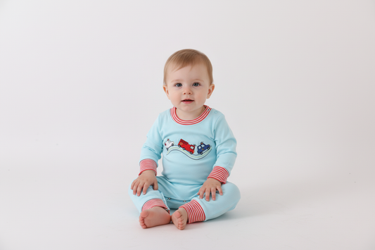 Blue vehicle emboridery romper